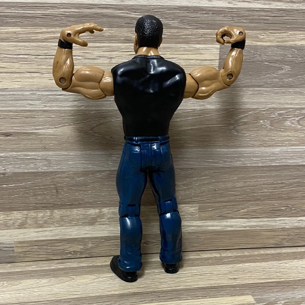 WWE Wrestling Action Figures with Black Shirts and Blue Jeans